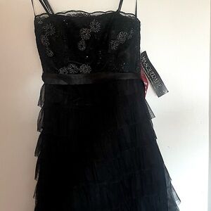 Strapless black ball gown formal dress with glitter appliqué